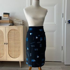 Lularoe blue eighties triangle print Stretchy pencil skirt, size L. GUC